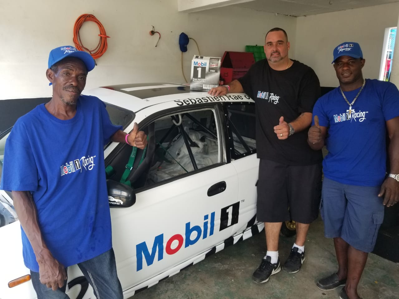 IMCA Jamaica sponsors RaceCar Driver Sebastian Rae to promote Mobil 1 Lubricants.